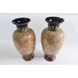A pair of Royal Doulton Slaters patent vases with typical floral decoration, 33cm high