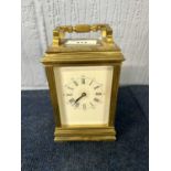 A 20th Century carriage clock with key