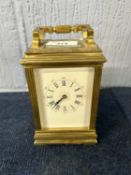 A 20th Century carriage clock with key