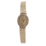 A 9ct gold Buche Girord ladies wristwatch, the watch has a 9ct gold case stamped in the inside of