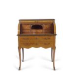 A 20th Century continental cylinder front bureau decorated with inlaid floral detail and applied