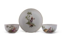 A mid 18th Century Meissen cup and saucer decorated with musicians and further cup decorated with