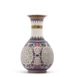 An unusual Chinese porcelain baluster vase of reticulated form, the vase with an internal cylinder