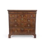 18th Century and later walnut chest with three short over three long drawers raised on bracket feet,