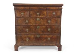 18th Century and later walnut chest with three short over three long drawers raised on bracket feet,