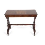 A Victorian walnut veneered and inlaid table, the centre of the top with a chess board decoration,