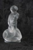 Lalique model of Leda and a swan in clear and frosted glass with etched mark to base, 11cm high