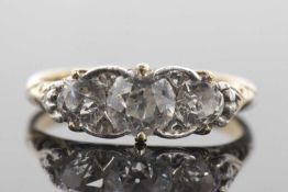 Three stone diamond ring, the graduated round old brilliant cut diamonds, total estimated approx.