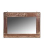 An Arts & Crafts copper mounted rectangular wall mirror with Celtic Entrelac decoration attributed