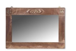 An Arts & Crafts copper mounted rectangular wall mirror with Celtic Entrelac decoration attributed