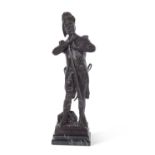 A large bronze figure of a soldier with rifle set on a stepped polished marble base, 70cm high