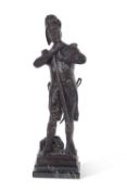 A large bronze figure of a soldier with rifle set on a stepped polished marble base, 70cm high