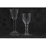 18th Century wine glass with funnel bowl above clear stem together with a further glass with a