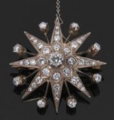 Victorian adaptable starburst brooch/pendant, the cental diamond set motif surrounded within an