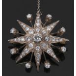 Victorian adaptable starburst brooch/pendant, the cental diamond set motif surrounded within an