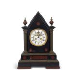 A large 19th Century French mantel clock, the white enamel face signed Au Lingot D'Or E.Bordies,