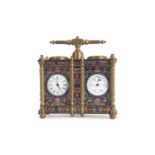 A reproduction brass and cloisonne panelled carriage clock/barometer combination with capstan formed