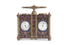 A reproduction brass and cloisonne panelled carriage clock/barometer combination with capstan formed