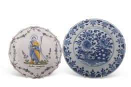 Two 18th Century Dutch delft plates, one with a blue and white floral design the other with a
