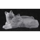 Pair of Lalique reclining cats in clear and frosted glass, etch mark to base, 15cm long