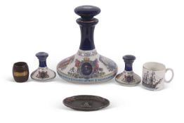 A group of Nelson related items including a large Wade ships decanter with British Navy Pusser Rum