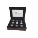 A cased set of silver proof coins made to commemorate the 80th Birthday of Queen Elizabeth II 2006
