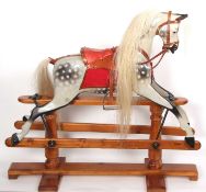 G & J Lines- A fine early 20th century dappled grey rocking horse with metal rocker and later
