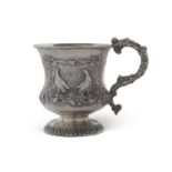 A heavy quality Victorian christening mug of campana form, gilt lined interior, cast grotesque