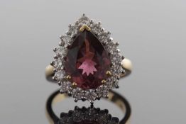 18ct yellow and white gold Pear cut Tourmaline and round brilliant cut diamond cluster ring.