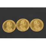A group of three Austrian gold 4 Ducat coins each "dated" 1915 (re-strikes), 4cm diameter, total