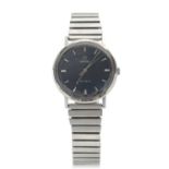 An Omega Geneve gents watch with a blue dial and silver coloured baton hour markers and hands, has a