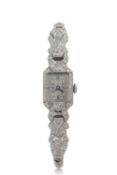 A Art Deco diamond and precious metal ladies cocktail watch, the bracelet is stamped 9ct on the