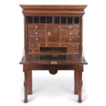 18th Century walnut veneered secretaire cabinet, the top section with moulded cornice over a