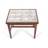 A 20th Century mahogany rectangular coffee table, the top inset with twelve 18th Century Dutch delft