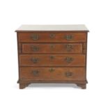 A George III mahogany and cross banded secretaire chest of four drawers, raised on bracket feet,