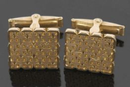 18ct gold cufflinks, the off-square patterned panels, approx. 1.6 x 1.8cm, with hinged fittings