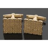 18ct gold cufflinks, the off-square patterned panels, approx. 1.6 x 1.8cm, with hinged fittings