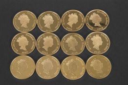 A box set of 12 gold plated (on silver) coins "The Golden History of Powered Flight", each coin 36mm