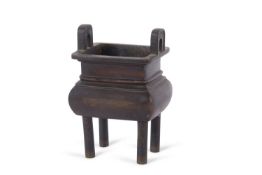 Incense burner of Archaistic form mounted on four legs, 16cm high