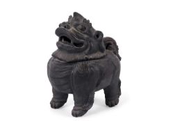 An unusual bronzed effect incense burner decorated as a mythical beast, in a ceramic body rather