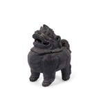 An unusual bronzed effect incense burner decorated as a mythical beast, in a ceramic body rather