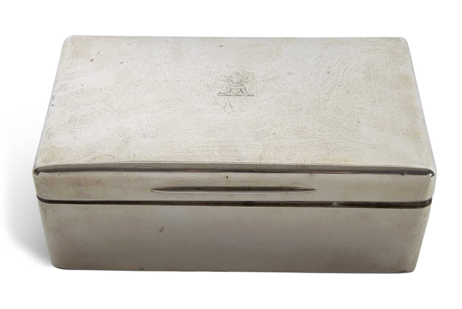 A large Edward VII silver encased cigar box of plain polished rectangular form. The slightly domed