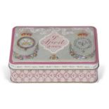 Tin containing wedding cake from the wedding of the then Prince of Wales and Duchess of Cornwall