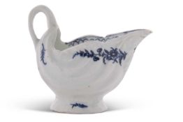Lowestoft porcelain dolphin ewer with blue and white floral decoration