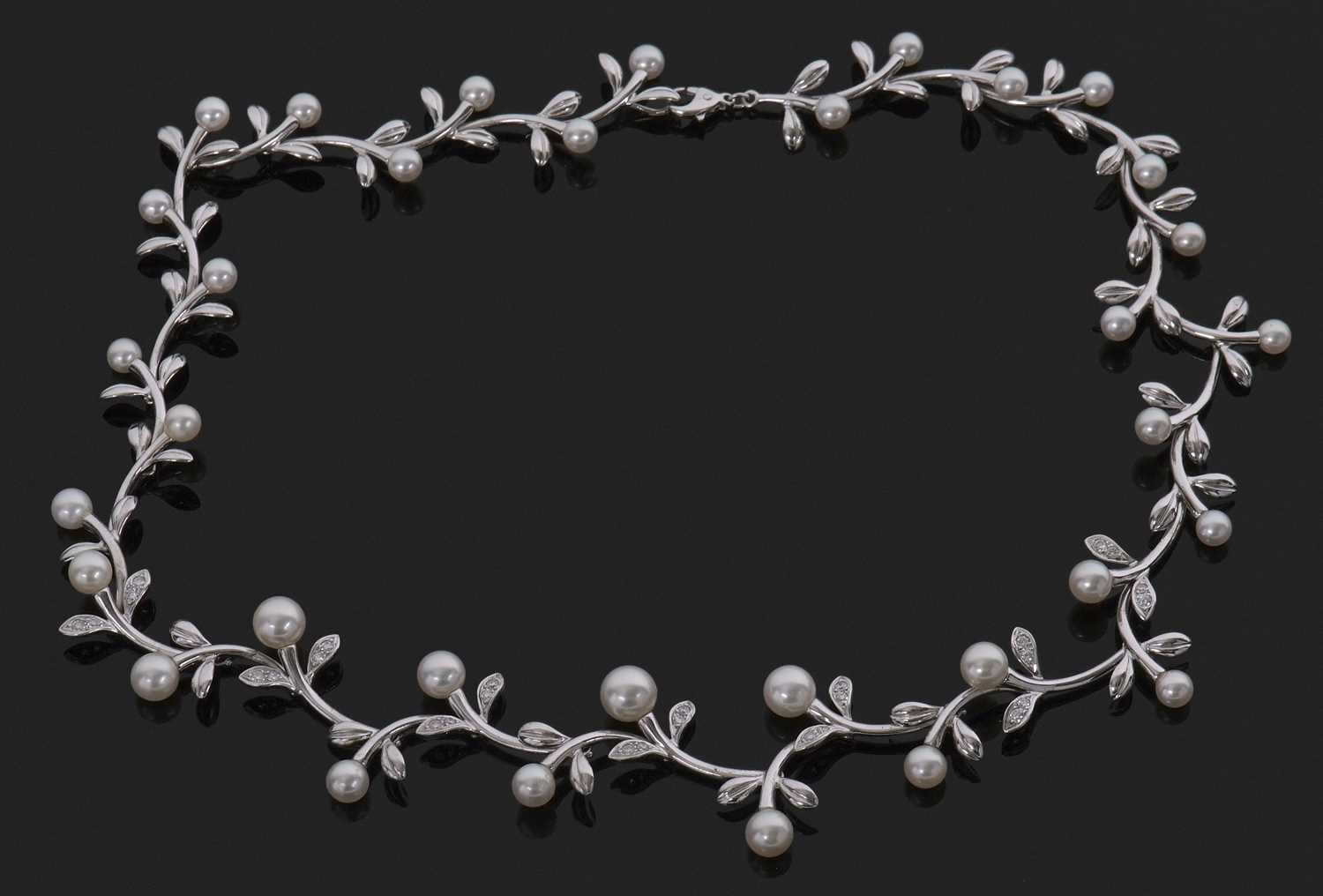 Mikimoto cultured pearl and diamond set necklace, a continuous leaf and pearl design highlighted