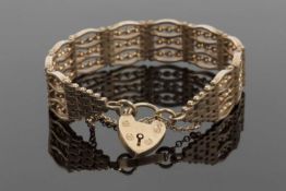 9ct fancy link bracelet, stamped 375, with heart shaped clasp, 36.9gms