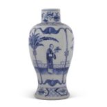 A Chinese porcelain baluster shape vase decorated in blue and white with Chinese figures in Kangxi