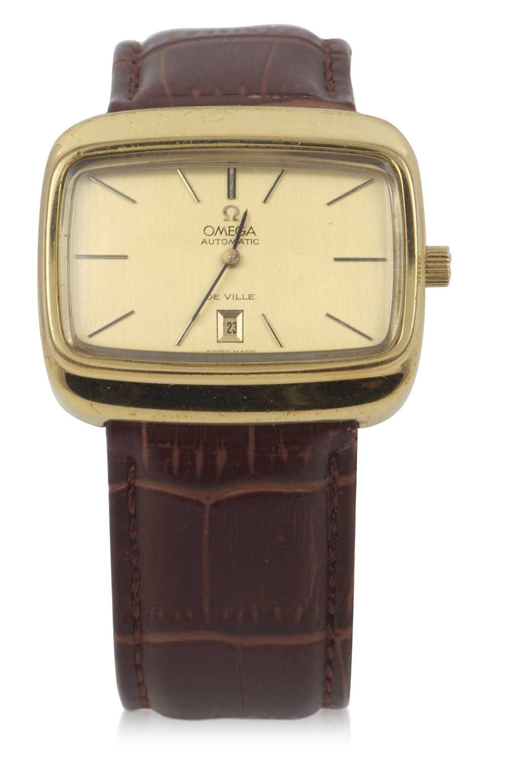 An Omega De Ville automatic gents watch, the watch has a gold plated case with matching gold