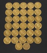 A collection of 32 Austrian gold 1 Ducat coins each "dated" 1915, (re-strikes), each weighing 3.4