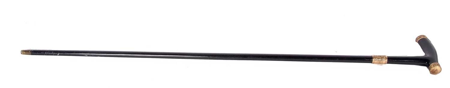 A late 19th Century ebonised walking cane/stick with foliate engraved 18ct gold mounts (each mount - Image 2 of 8